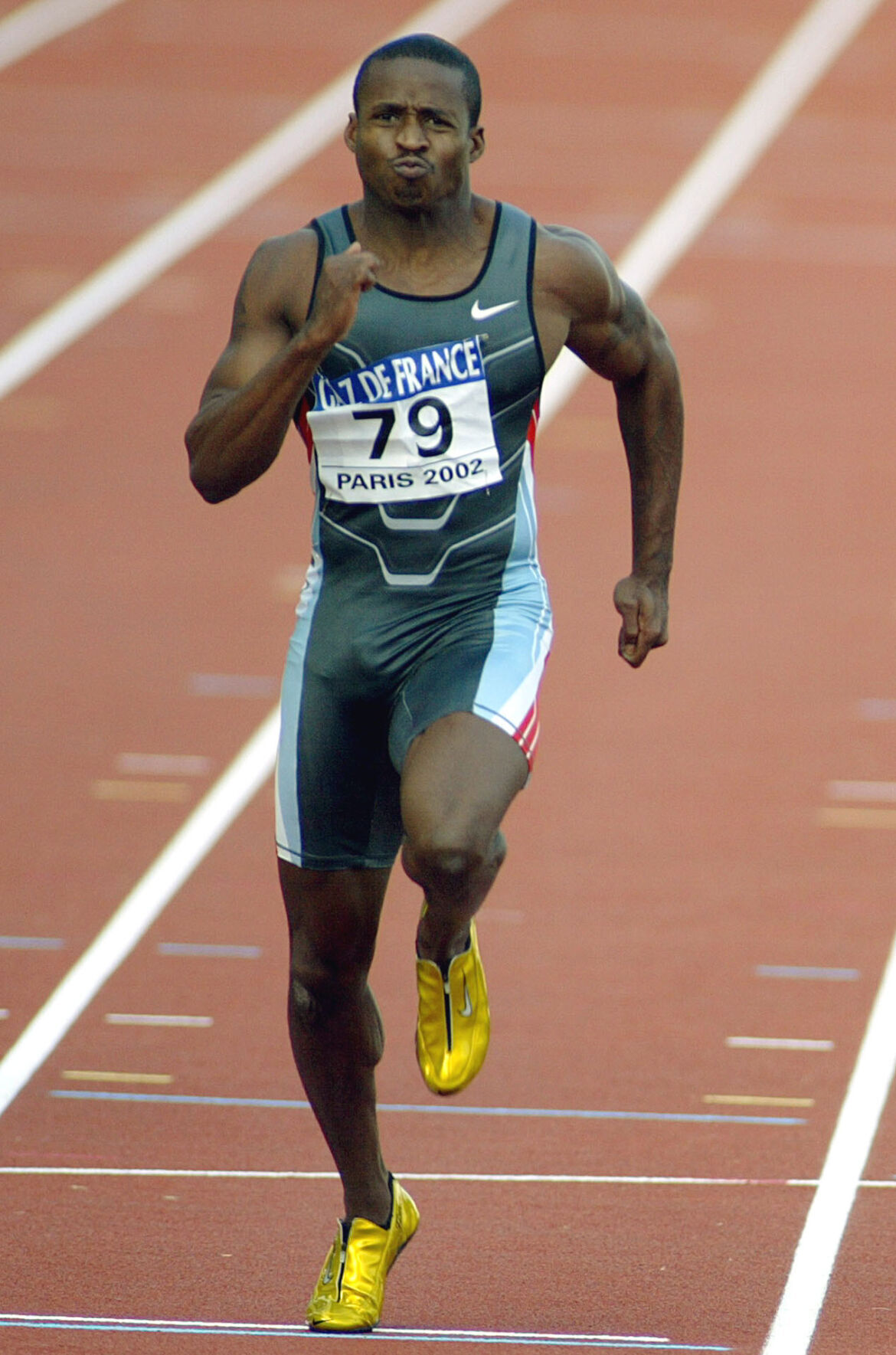 2002: Tim Montgomery sets world record in 100 meters